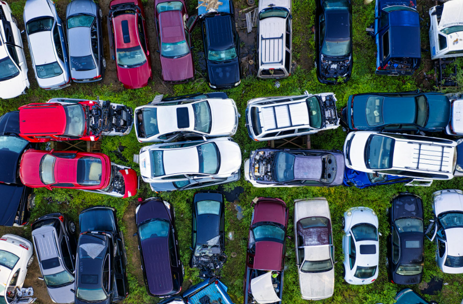 Cars in a junkyard.